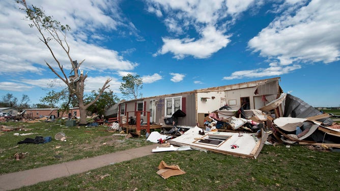 A mobile home is left in ruins after an EF3 tornado swept through the Pinaire Mobile Home Park on April 15, 2012 in Wichita, Kansas.