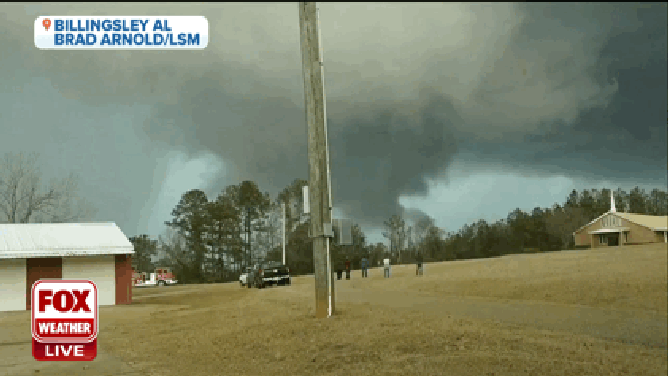 What appears to be a funnel cloud descends towards the ground Thursday, January 12, 2023 in Billingsley, Alabama.