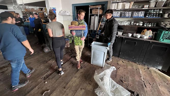 Clean-up efforts inside Zelda's on the Beach.