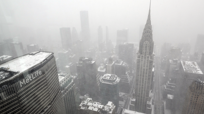 FILE - An aerial view of The Chrysler Building as seen from Summit One Vanderbilt during a snow storm on January 29, 2022 in New York City.