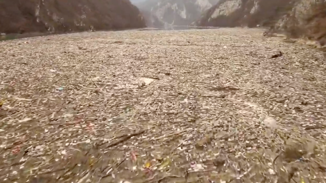 The footage continues to show the garbage nearly taking up the entire width of the River Drina. January 16, 2023.