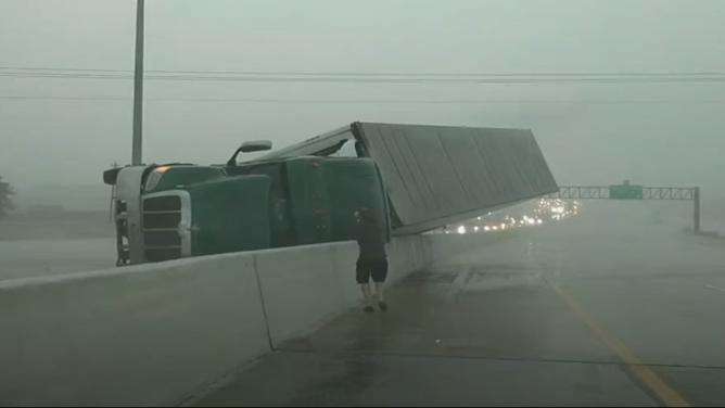 Chaser Brandon Copic checks on overturned tractor Trailer outside Houston, TX. January 24, 2023.