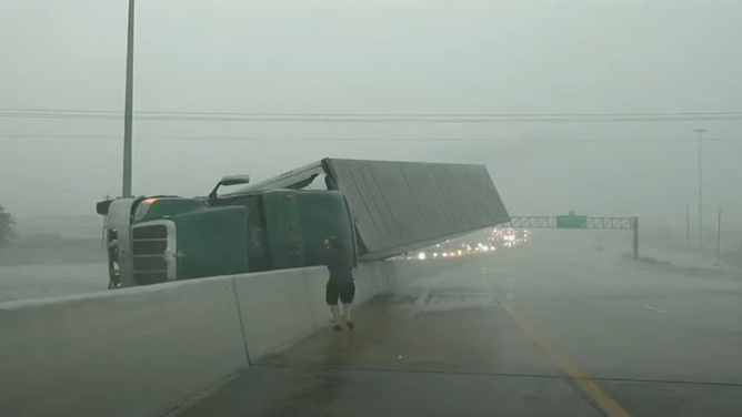 Chaser Brandon Copic checks on overturned tractor Trailer outside Houston, TX. January 24, 2023.