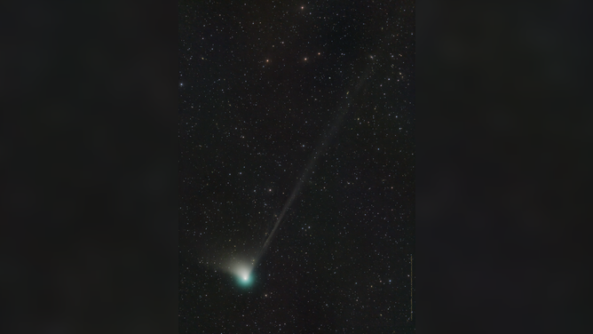 A green Comet C/2022 E3 (ZTF) zooming through the sky.