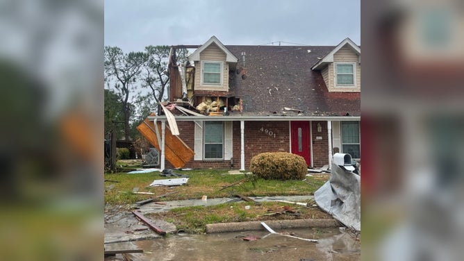 Home loses portion of its roof during storm on January 24, 2023.