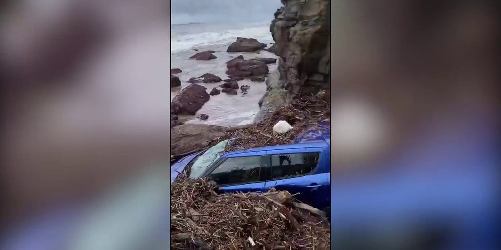 watch-car-gets-swept-out-to-sea-by-raging-floodwaters-in-australia