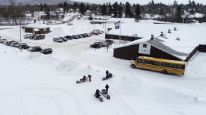 What factors go into a snow day for school districts?