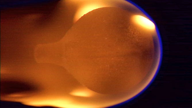This image shows a 4-cm diameter sphere of acrylic burning in microgravity on the ISS.