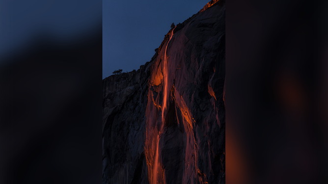 FILE - Horsetail Fall glows during the Firefall event in Yosemite National Park outside Merced, Calif., on Saturday, February 20, 2021. Every February the park is descended upon by visitors hoping to catch the 