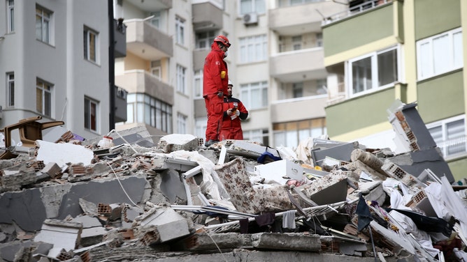 ADANA, TURKIYE - FEBRUARY 06: Rescue and search efforts continue on collapsed 14-store-building after 7.7 magnitude earthquake hits Adana, Turkiye on February 06, 2023. Disaster and Emergency Management Authority (AFAD) of Turkiye said the 7.7 magnitude quake struck at 4.17 a.m. (0117GMT) and was centered in the Pazarcik district in Turkiyeâs southern province of Kahramanmaras. Gaziantep, Sanliurfa, Diyarbakir, Adana, Adiyaman, Malatya, Osmaniye, Hatay, and Kilis provinces are heavily affected by the quake. (Photo by Eren Bozkurt/Anadolu Agency via Getty Images)