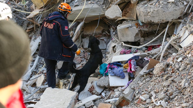 OSMANIYE, TURKIYE - FEBRUARY 06: Search and rescue operations continue at collapsed building after 7.7 and 7.6 magnitude earthquakes hits Osmaniye, Turkiye on February 06, 2023. Disaster and Emergency Management Authority (AFAD) of Turkiye said the 7.7 magnitude quake struck at 4.17 a.m. (0117GMT) and was centered in the Pazarcik district and 7.6 magnitude quake struck in Elbistan district in the province of Kahramanmaras in the south of Turkiye. Gaziantep, Sanliurfa, Diyarbakir, Adana, Adiyaman, Malatya, Osmaniye, Hatay, and Kilis provinces are heavily affected by the earthquakes. (Photo by Ozan Efeoglu/Anadolu Agency via Getty Images)