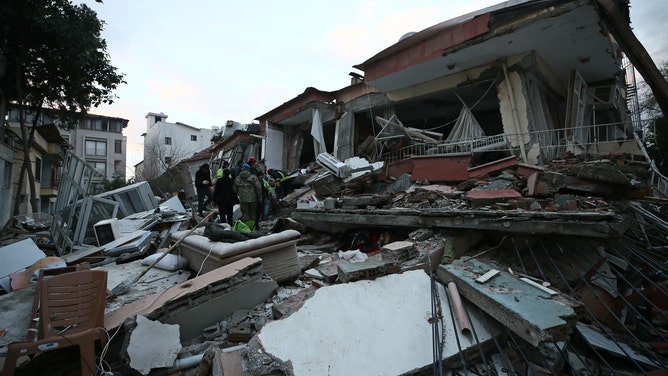 HATAY, TURKIYE - FEBRUARY 07: Turkish soldiers and search and rescue team work in Hatay after 7.7 and 7.6 magnitude earthquakes hit multiple provinces of Turkiye on February 07, 2023. Early Monday morning, a strong 7.7 earthquake, centered in the Pazarcik district, jolted Kahramanmaras and strongly shook several provinces, including Gaziantep, Sanliurfa, Diyarbakir, Adana, Adiyaman, Malatya, Osmaniye, Hatay, and Kilis. Later, at 13.24 p.m. (1024GMT), a 7.6 magnitude quake centered in Kahramanmaras' Elbistan district struck the region. Turkiye declared 7 days of national mourning after deadly earthquakes in southern provinces. (Photo by Eren Bozkurt/Anadolu Agency via Getty Images)