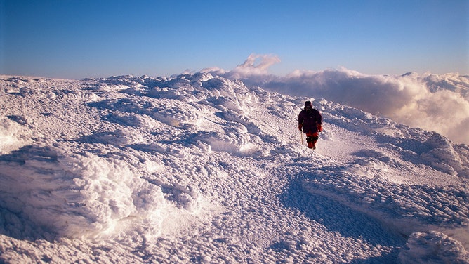 Hiker on Mount Washington