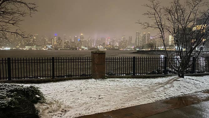 A view of the Manhattan skyline from Weehawken, New Jersey, as a winter storm brings snow to the Northeast on Monday, Feb. 27, 2023.