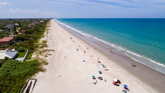 FILE - Florida, Melbourne Beach, Ocean Park with Sunbathers.