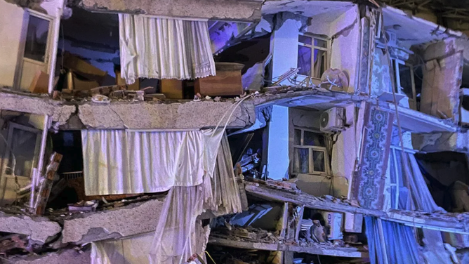 A view of a destroyed building after a 7.8-magnitude earthquake jolts Turkey's Kahramanmaras province on Feb. 6, 2023, in Diyarbakir, Turkey. Search and rescue operations continue in the area.