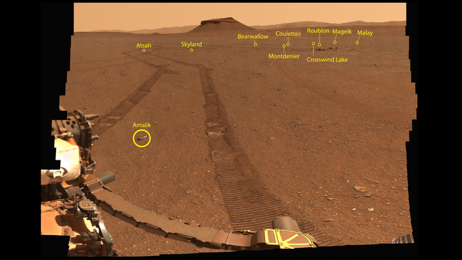 Image captured by NASA's Perseverance rover on Mars. The location of the 10 sample tubes are indicated in yellow.