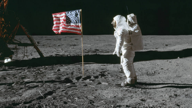 Apollo 11 astronaut Aldrin saluting the flag at Tranquility Base