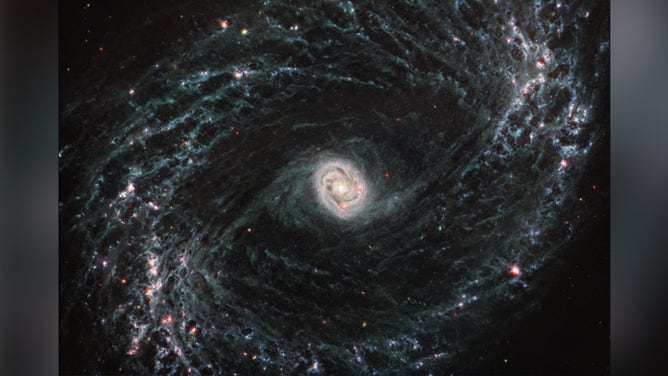 NGC 1433 is a barred spiral galaxy with a particularly bright core surrounded by double star forming rings.