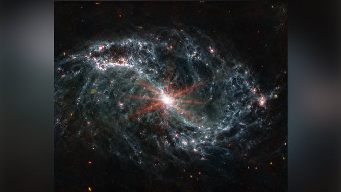 The spiral arms of NGC 7496 are filled with cavernous bubbles and shells overlapping one another in this image from MIRI. MIRI, or Mid-Infrared Instrument, is one of Webb’s four scientific instruments.