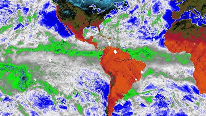 The eastern Pacific Ocean and the Atlantic Ocean. This map, made using COWVR's new observations from the ISS, shows Earth's microwave emissions at a frequency that provides information on the strength of winds at the ocean surface, the amount of water in clouds, and the amount of water vapor in the atmosphere.