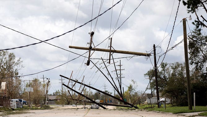 Power line poles are seen downed by Hurricane Ida in Houma, Louisiana, the United States, Aug. 30, 2021.