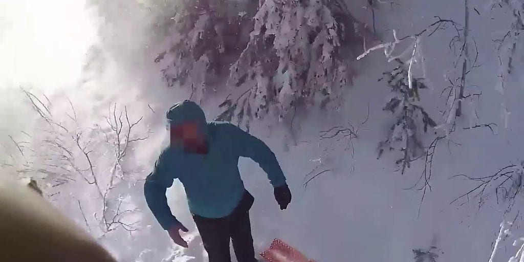 Watch Helicopter swoops in to rescue stranded hiker in freezing