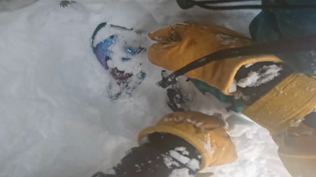 Video shows dramatic rescue of snowboarder buried in feet of snow