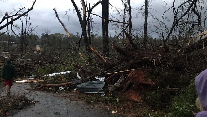 Possible tornado damage is seen in West Point, Georgia, on Sunday, March 26, 2023.