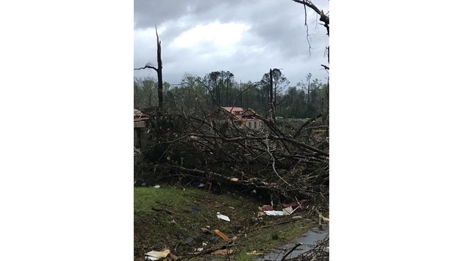 Possible tornado damage is seen in West Point, Georgia, on Sunday, March 26, 2023.