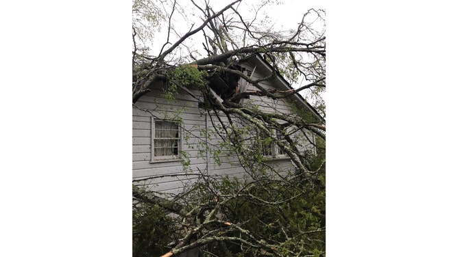 Possible tornado damage is seen in West Point, Georgia, on Sunday, March 26, 2023.