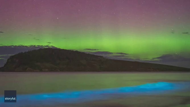 A photographer captured time lapse video of a dazzling aurora lighting up the sky above bioluminescent waves in the Greater Hobart Area, Tasmania, on February 16.