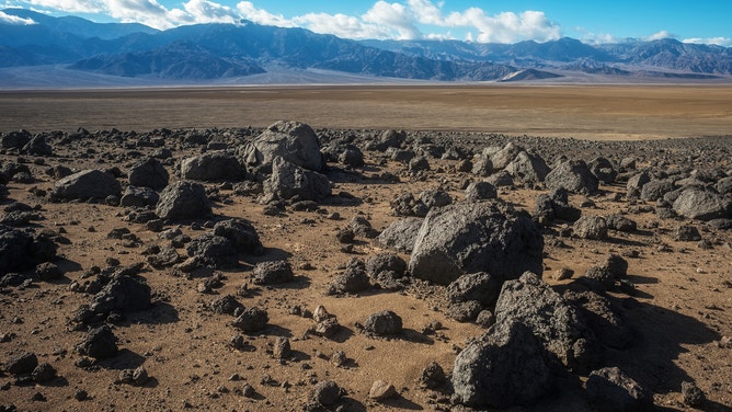 Loose collections of basalt boulders speak to the volcanic history buried in Death Valley's past.