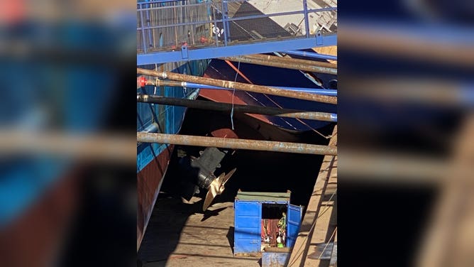 Large Research Vessel Tips Onto Scotland Dock