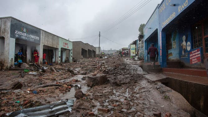 In Chimwankhunda, Malawi, a street covered in mud and debris after flooding caused by Freddy subsided. March 14, 2023.