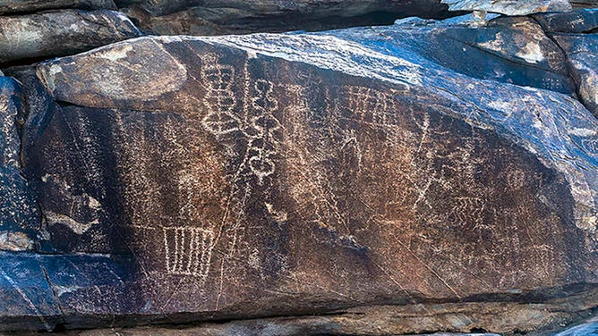 Native American petroglyphs line the rock walls along the canyon bottom in Hiko Springs within the proposed Avi Kwa Ame National Monument site in Nevada. 