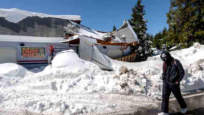 Desperate Crestline residents help one another while awaiting assistance from San Bernardino County
