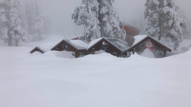 Rooftops peek over the snow at Heavenly Mountain Resort. 