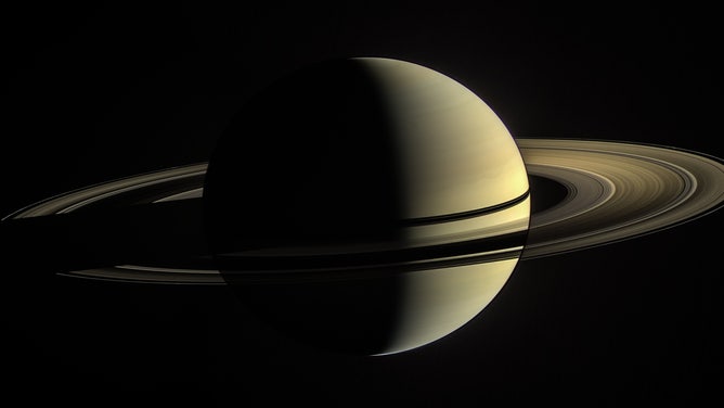 This was Cassini’s view from orbit around Saturn on Jan. 2, 2010. In this image, the rings on the night side of the planet have been brightened significantly to more clearly reveal their features.