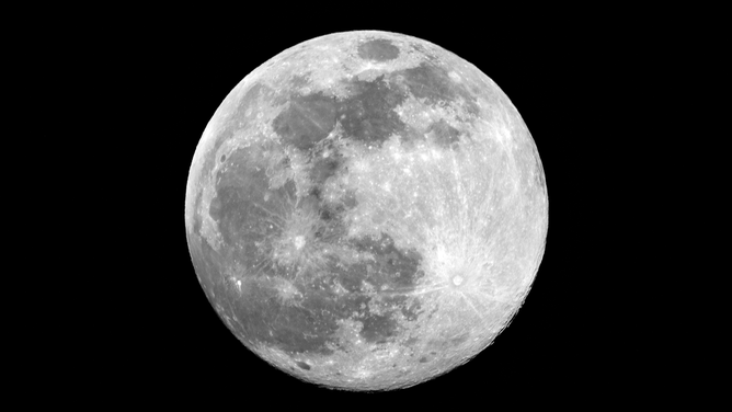 Full moon rises above LAquila, Italy, on march 6, 2023. March full moon is also known as the worm moon, because it coincides with the time of year when earthworms begin to emerge from the thawing soils.