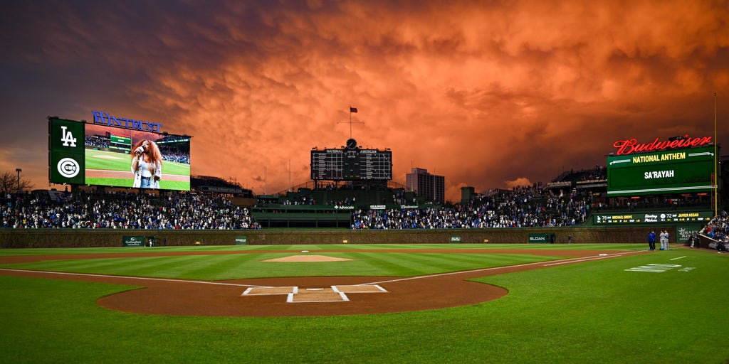Holy Cow! See Chicago's Wrigley Field skies erupt in color as storm clouds  greet Cubs-Dodgers game