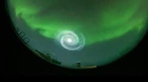 See the mysterious spiral swirling in Alaska sky amid aurora borealis