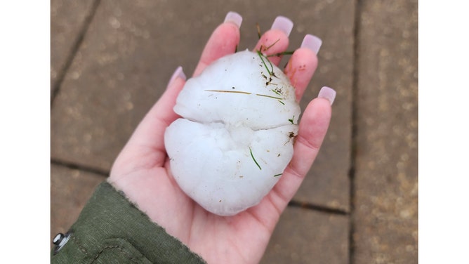 Large hail is seen in Davenport, Iowa, on Tuesday, April 4, 2023.
