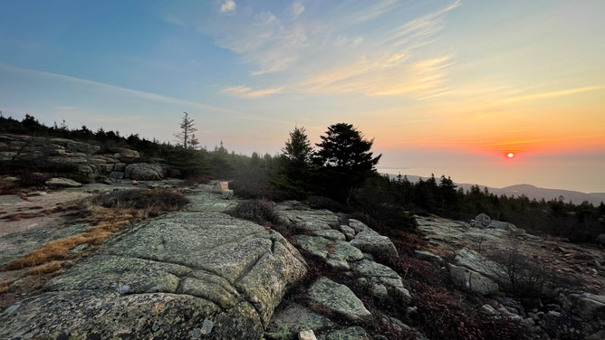 The sun sets on Cadillac Mountain.