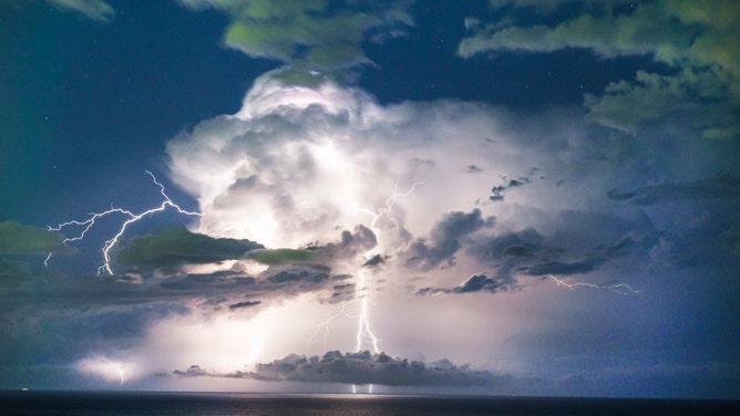Florida, Miami Beach, dramatic lightning storm over Atlantic Ocean at night