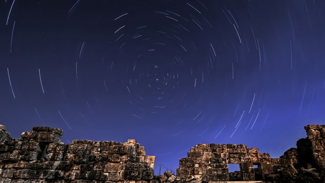 The April Lyrids, a meteor shower lasting from April 16 to April 26 each year, is seen over the ancient city of Aizanoi in Kutahya, Turkey on April 23, 2014.