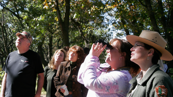 FILE - A ranger giving a guided tour of Miller Woods at Indiana Dunes National Lakeshore.