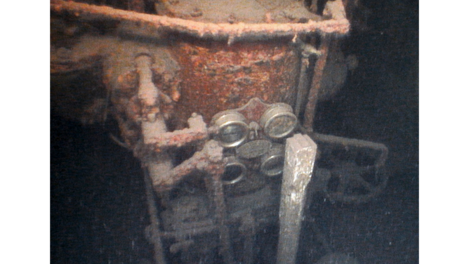 A triple expansion engine and brass gauge panel on the Curtis.