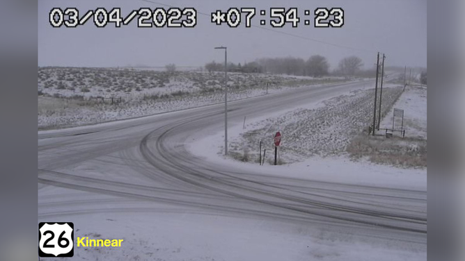A photo showing snow-covered roads on Route 26 in Kinnear, Wyoming, on April 4, 2023.