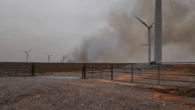 Smoke from a wildfire rises in Weatherford, Oklahoma. April 4, 2023.